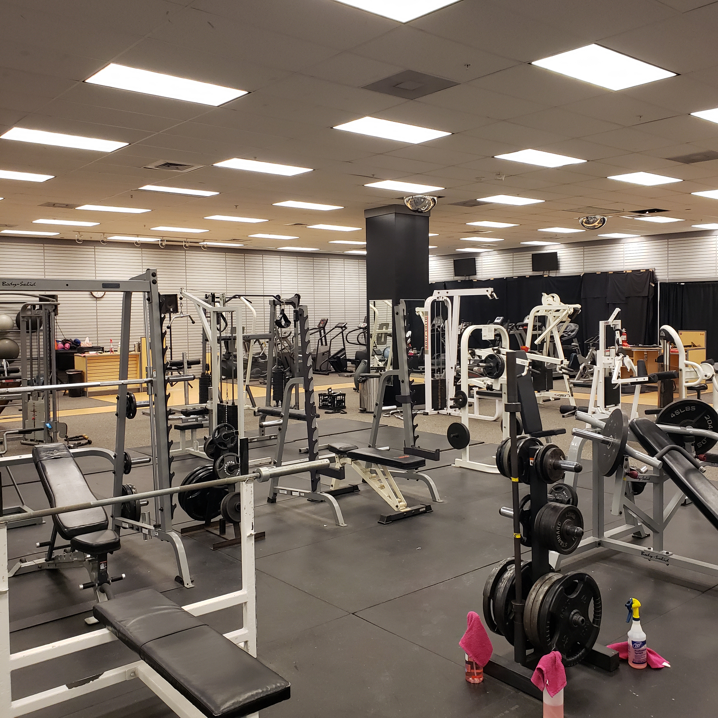 Members training on the Apex Fitness Center gym floor