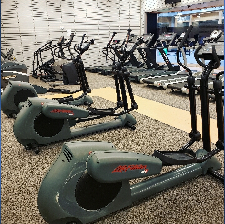 Cardio equipment at Apex Fitness Center